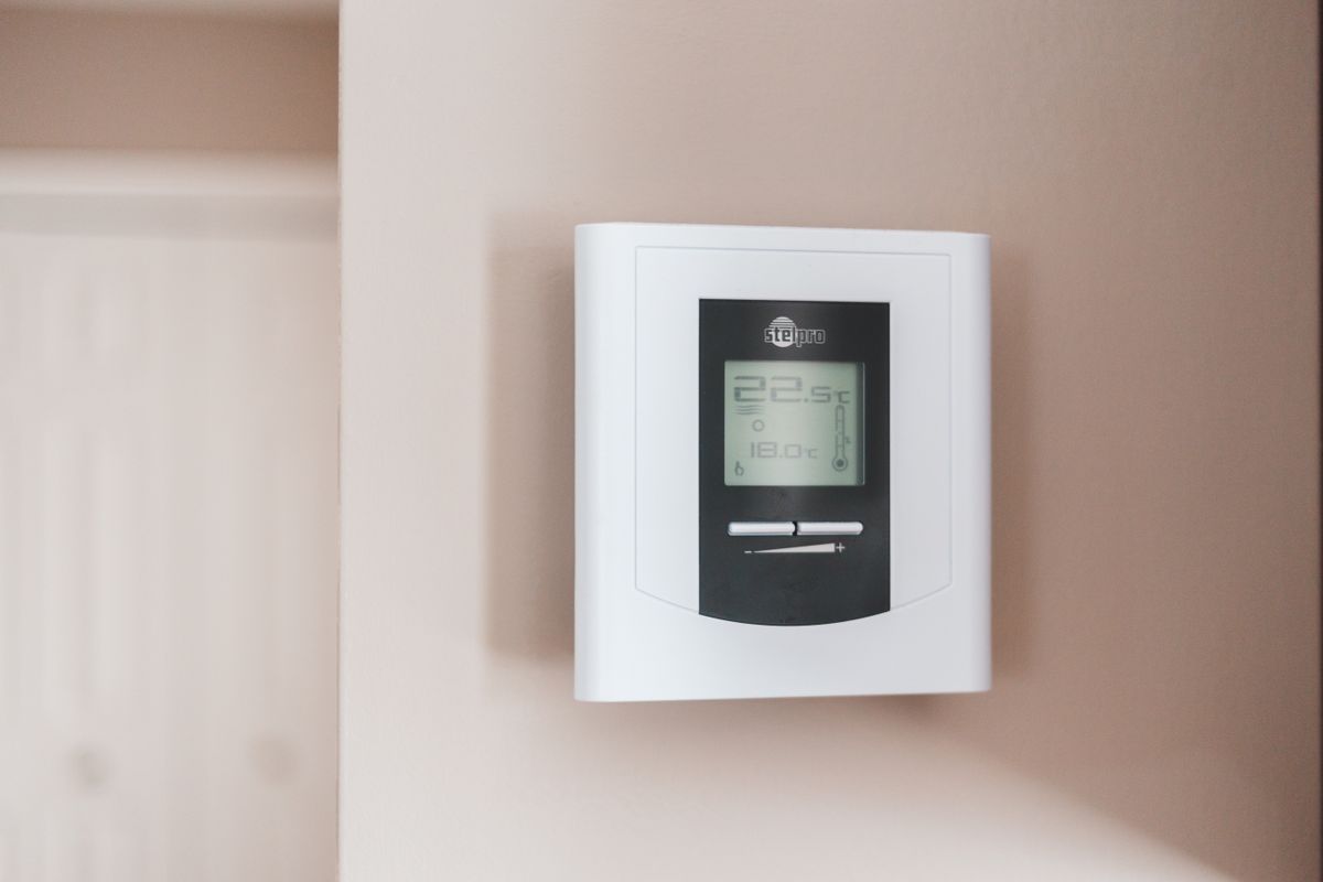 A wall-mounted heating control installed and set up — part of our Hive and Nest smart heating work.